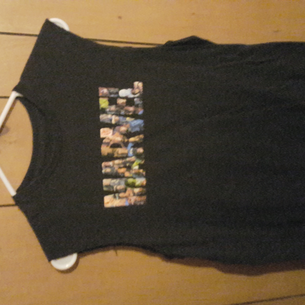 Marvel T-shirt with the sleeves cut out of it